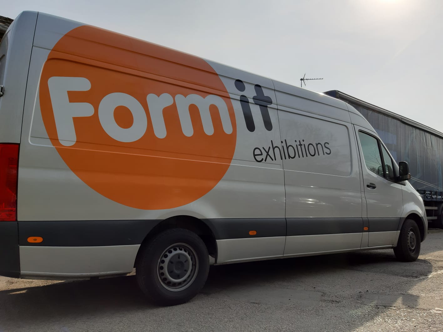 Fleet vehicle graphics and van branding produced by Backdrop Media