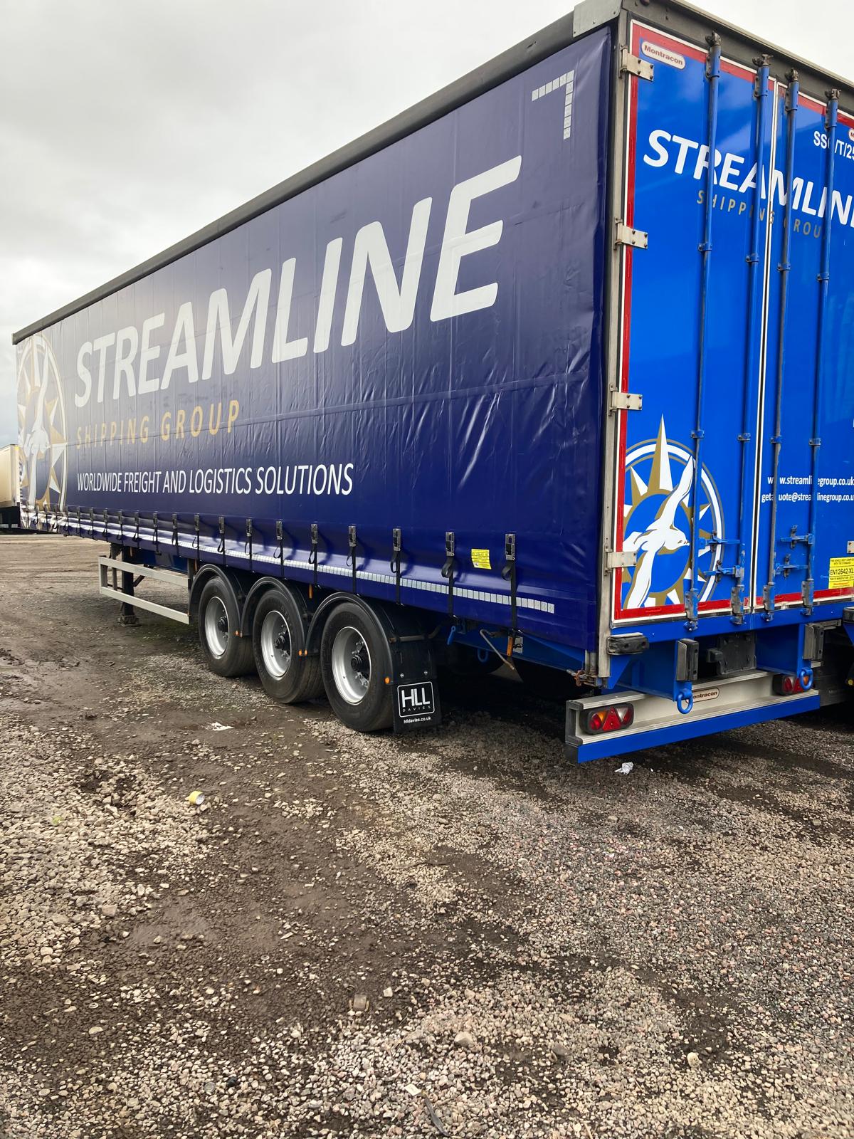 Vehicle graphics and fleet branding produced by Backdrop Media